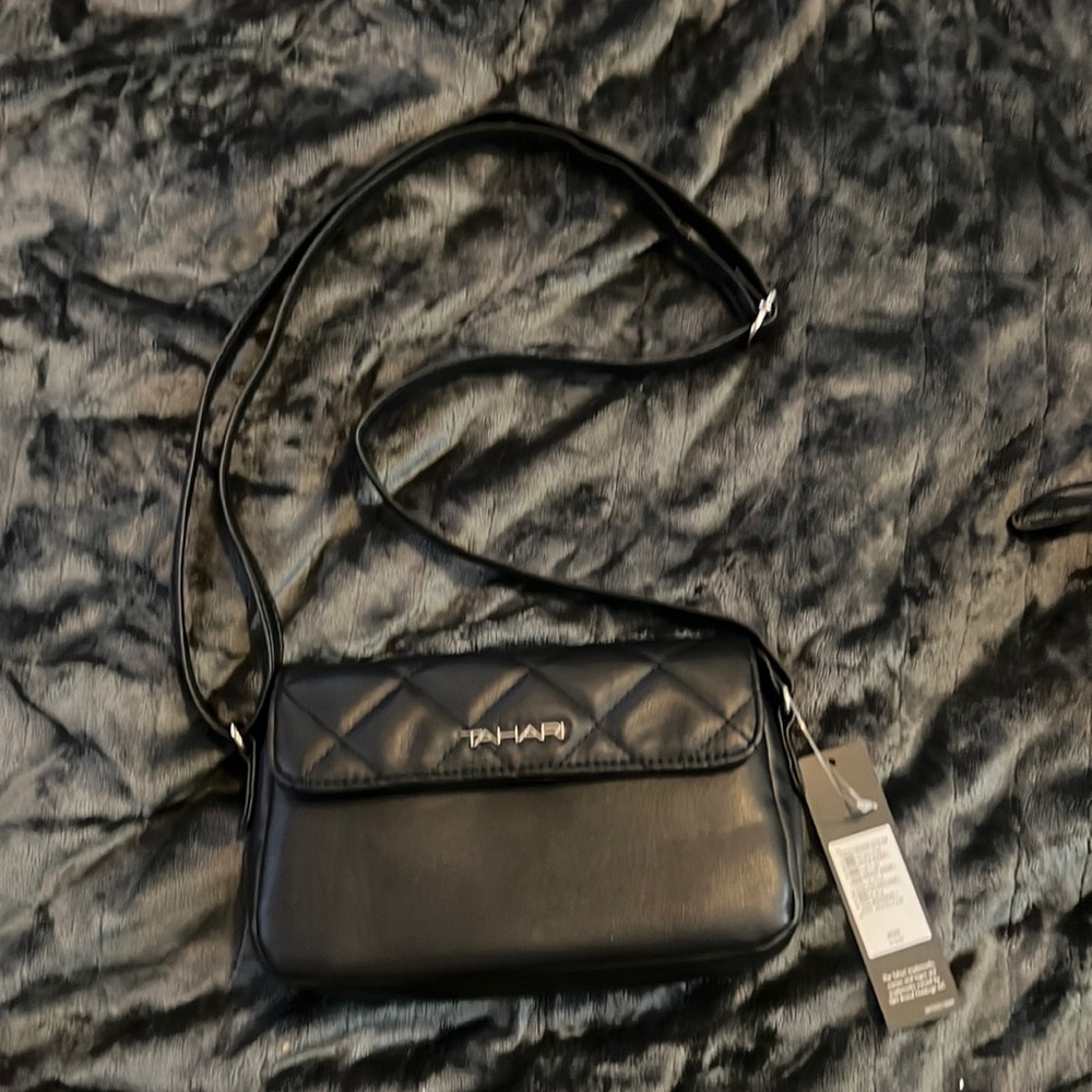 Small crossbody.  Adjustable strap.